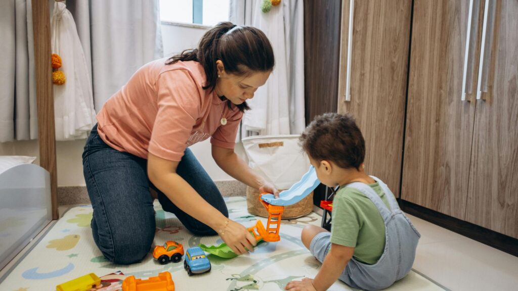Child making choices during an ABA therapy activity with therapist support