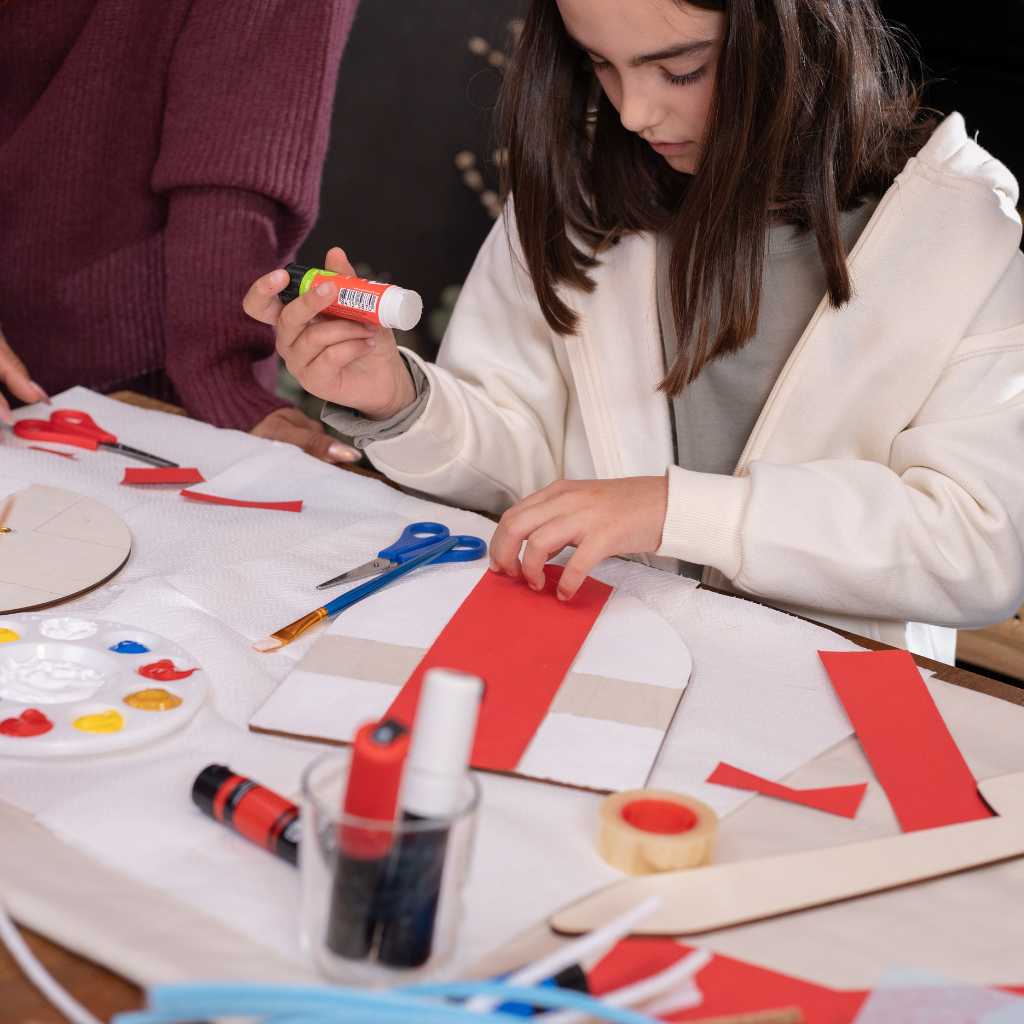 ABA therapy supports Valentine´s Day skills without masking as a child practices fine motor and social routines through a simple craft activity.