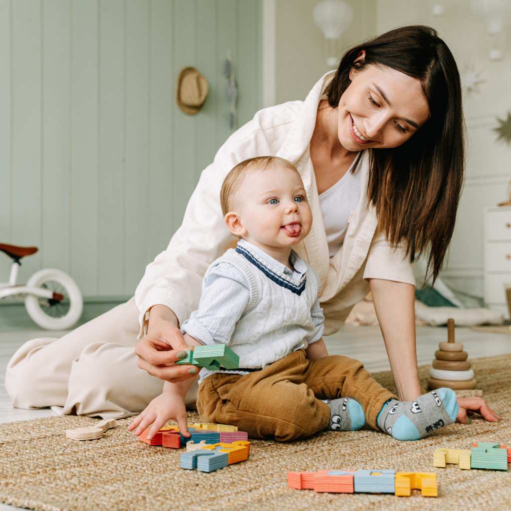 Mother observing her child during play