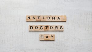 National Doctors Day is written on scrabble-like blocks