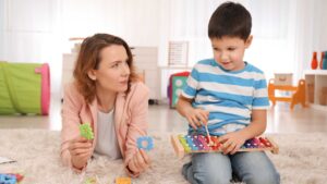 A clinician explaining the autism diagnosis to kid