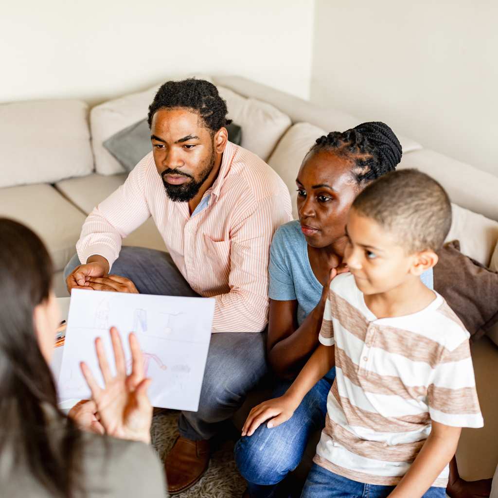 Parent participating in an ABA therapy session with their child