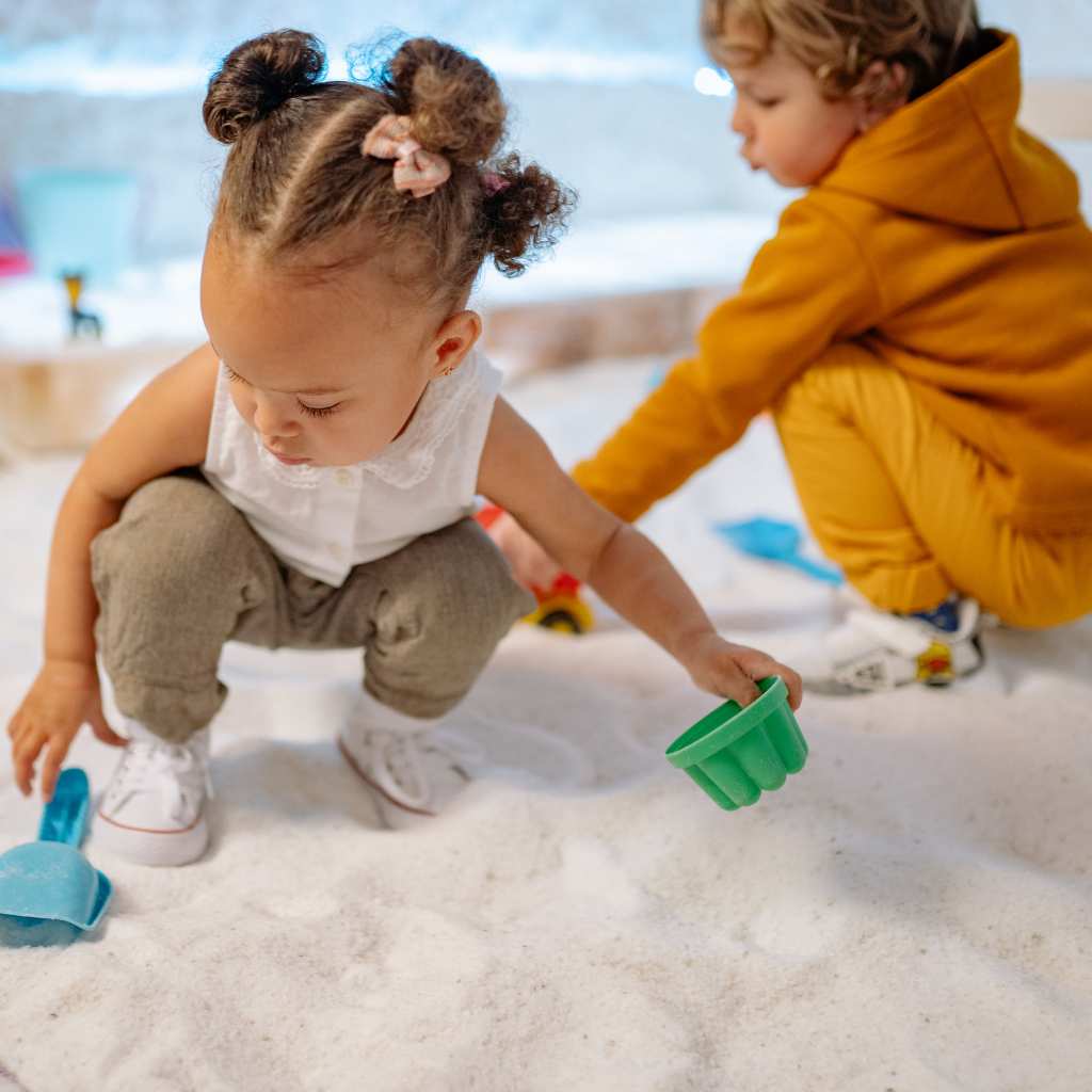 Toddlet playing with peer